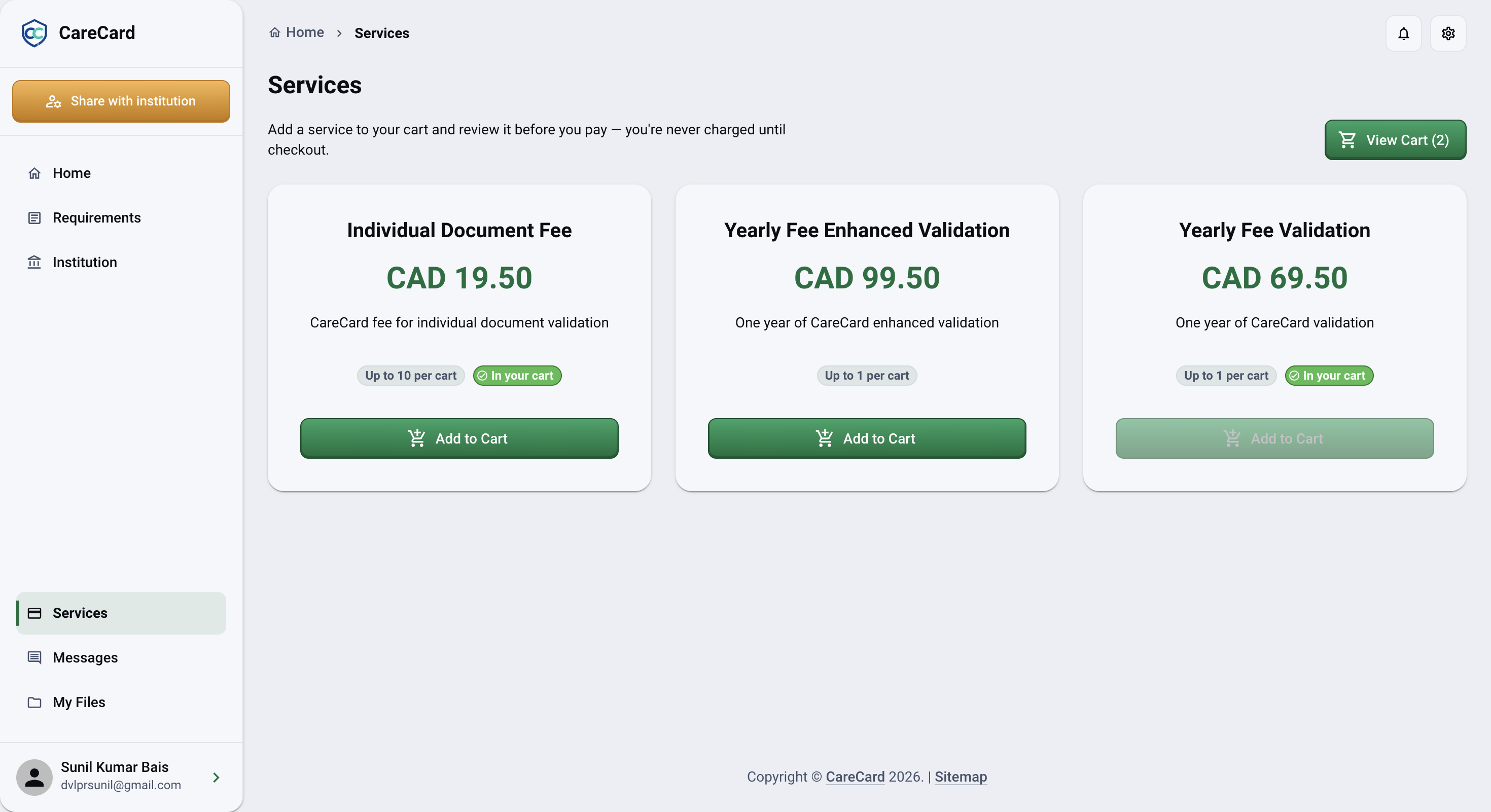 Services page after adding two services — Individual Document Fee and Yearly Fee Validation both show an In your cart badge, and the one-per-cart Yearly Fee Validation button is disabled